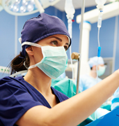 health care worker wearing wearing mask in hospital setting