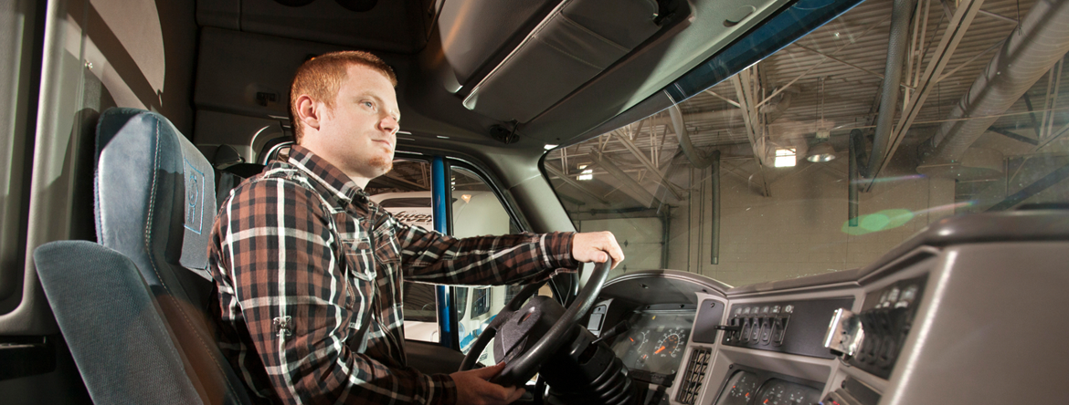 male student truck driver in a truck